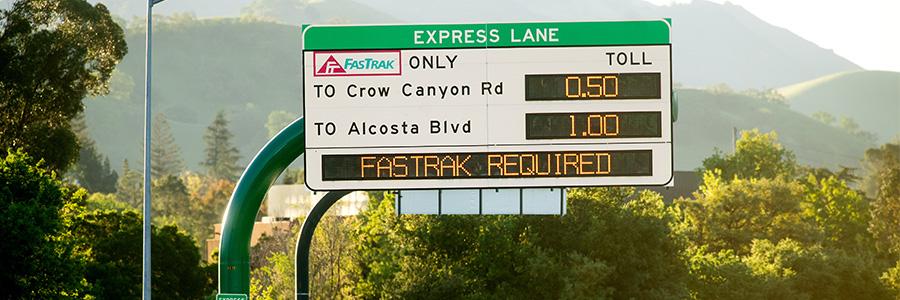 Photo of highway express lanes sign.