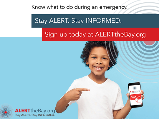 Person pointing to a phone that says ALERTtheBay