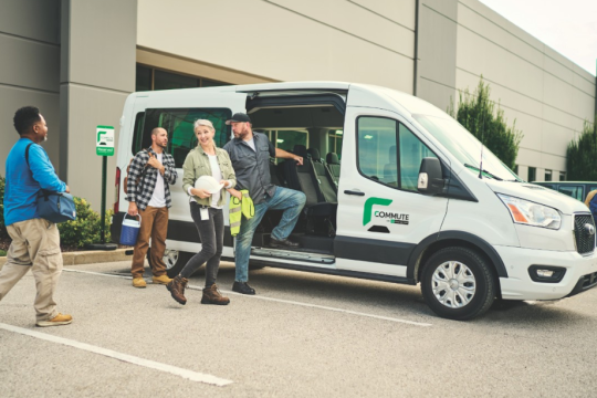 Group of people entering Enterprise Commute van.