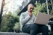 A man working on a laptop outdoors