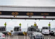 Toll lanes with information displays above them.