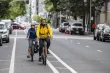 People biking in traffic