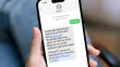 A view of a phone in hand.  The screen shows a text to 888777 with the text 511alert, and a response confirming the subscription, and how to cancel.