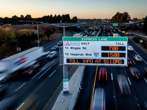 A variable toll messaging sign on I-880 showing tolls of $7 and $15