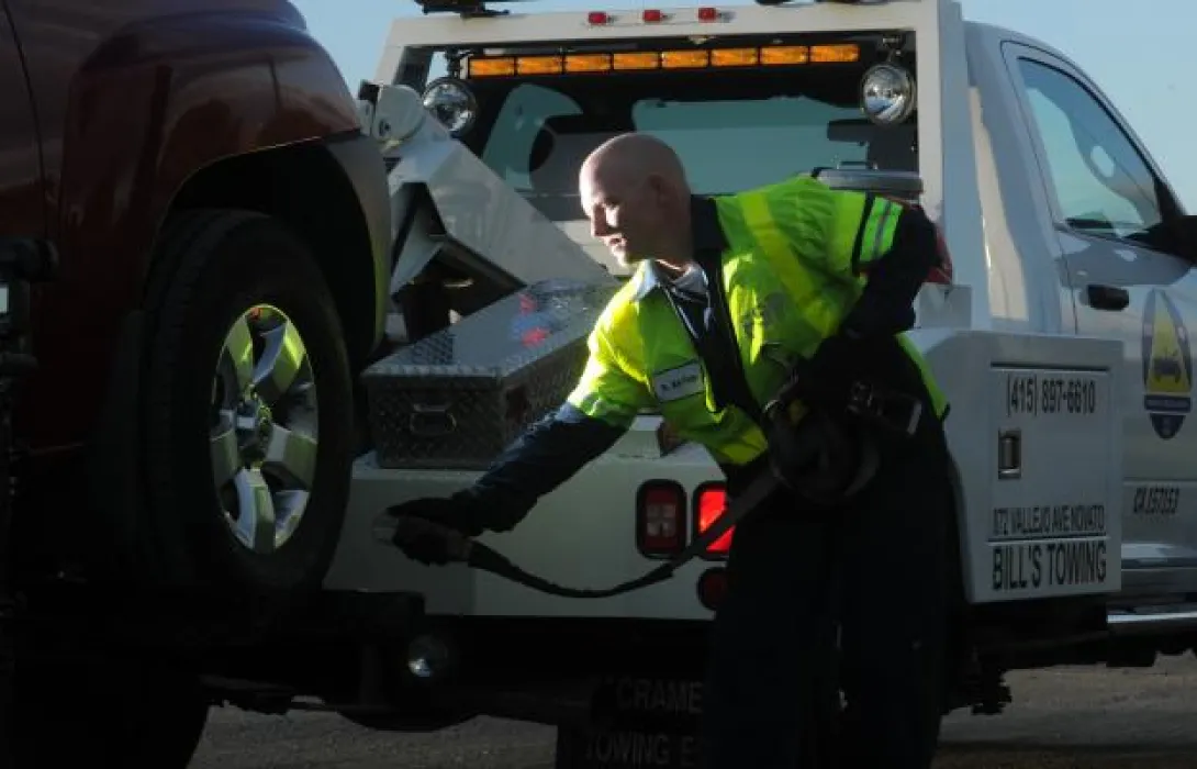 Technician towing vehicle